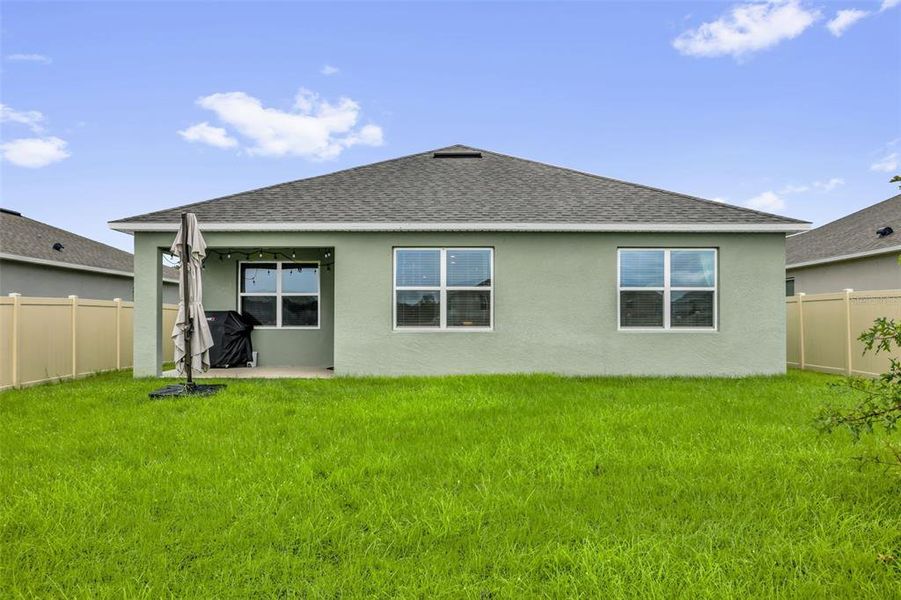 Exterior details and patio area of a home in Timberwalk, Mount Dora (Image 27).