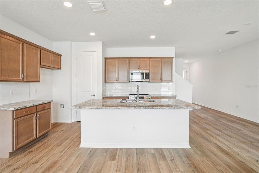Furnished interior view inside a new home in Isla Mirada, San Antonio (Image 6).