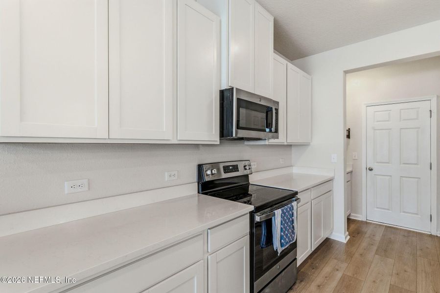 Furnished interior view inside a new home in , Jacksonville (Image 15).