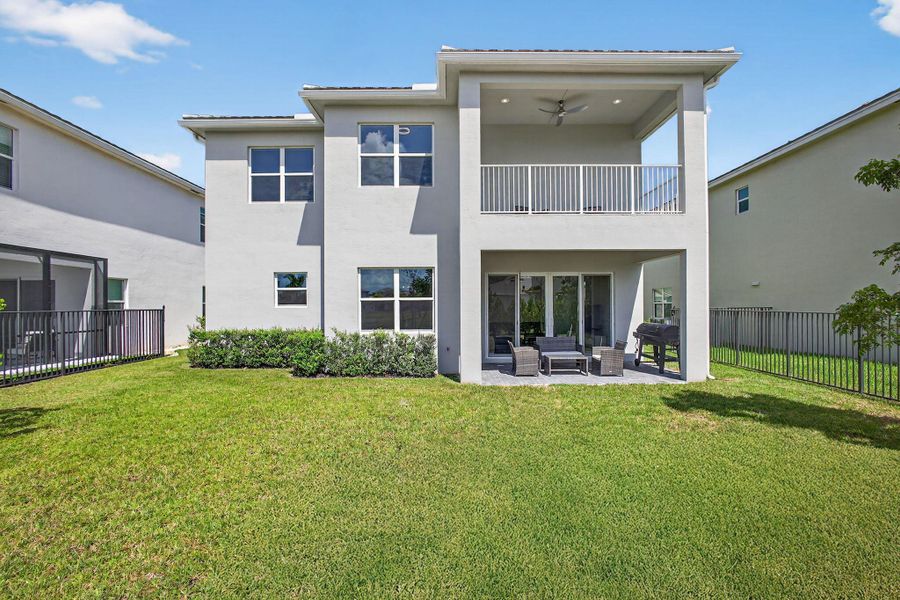 Front exterior of a new home in , The Acreage, FL, highlighting curb appeal (Image 31).