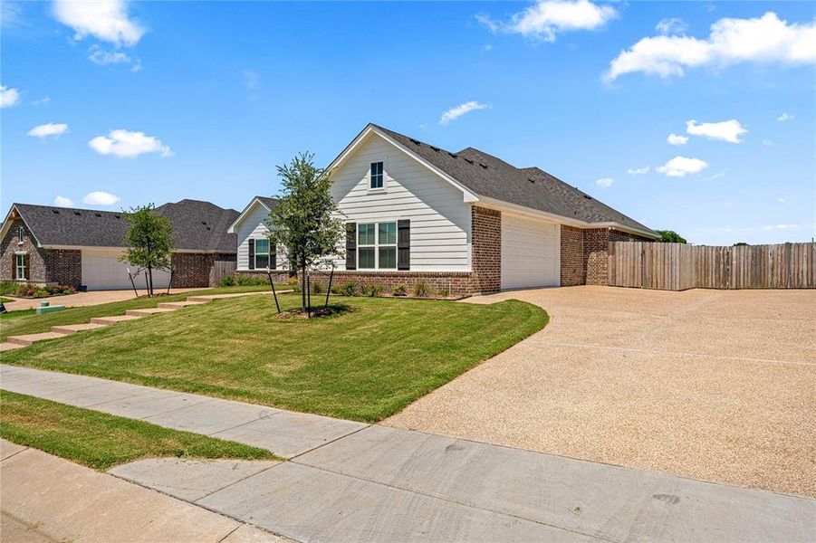 Front exterior of a new home in , Waco, TX, highlighting curb appeal (Image 26).