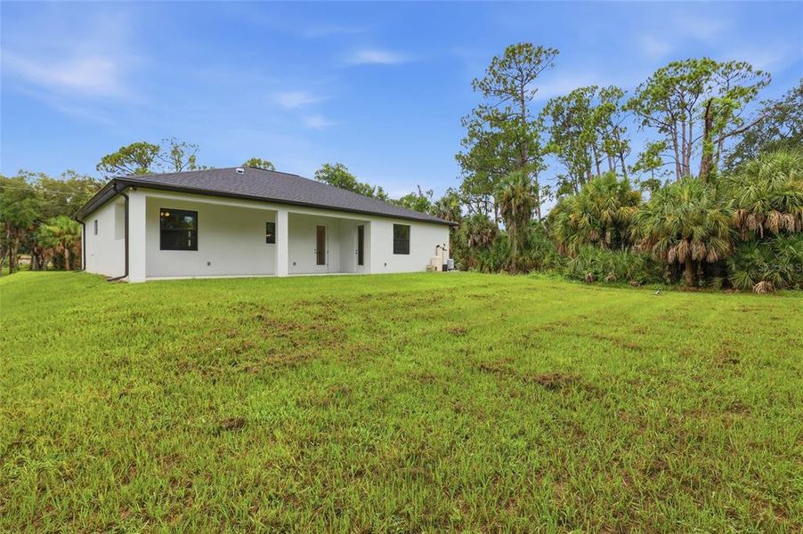 Exterior details and patio area of a home in , Port Charlotte (Image 4).