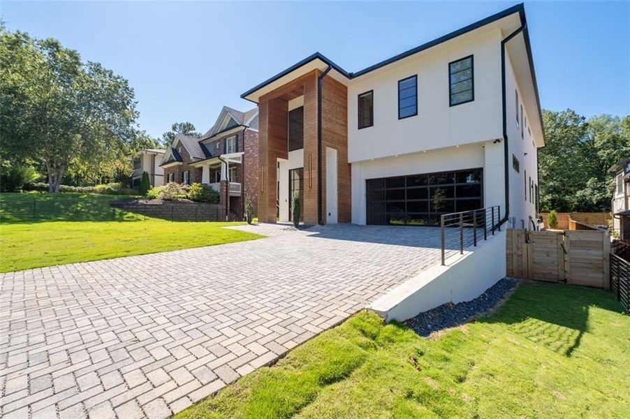 Front exterior of a new home in , Atlanta, GA, highlighting curb appeal (Image 25).