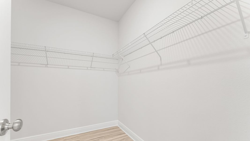 Representative unfurnished interior of a home built from the The Rhett by D.R. Horton in Pine Creek and Heron Walk, Port St. Joe (Image 38).