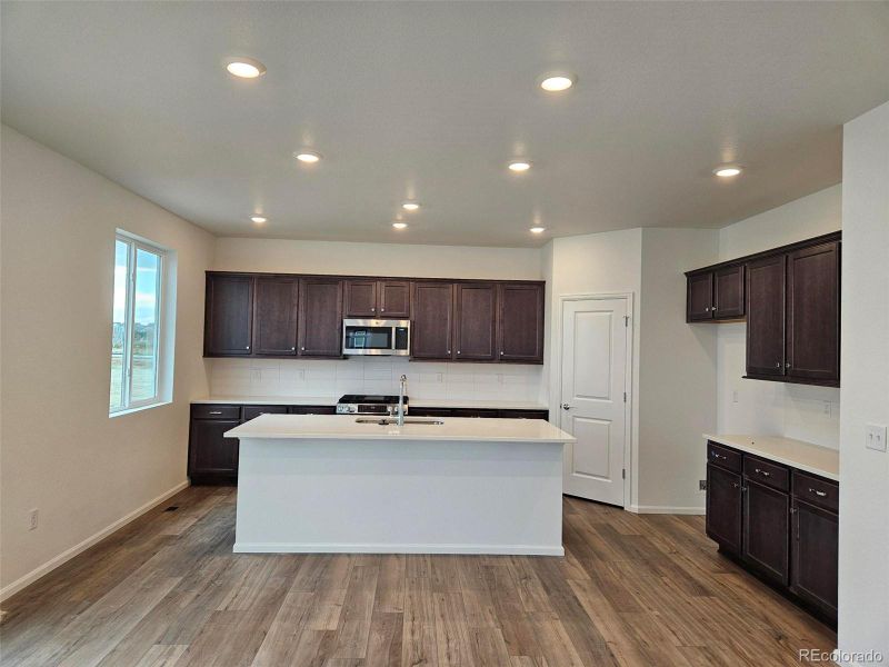 Furnished interior view inside a new home in The Cottages Collection at Ridgeline Vista, Brighton (Image 4). Furnished interior view inside a new home in The Cottages Collection at Ridgeline Vista, Brighton (Image 4).