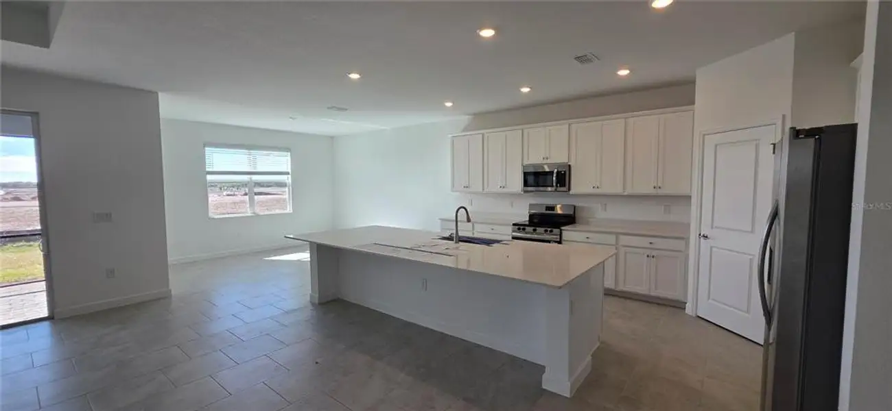 Furnished interior view inside a new home in Rye Ranch: Manor Homes, Parrish (Image 4).