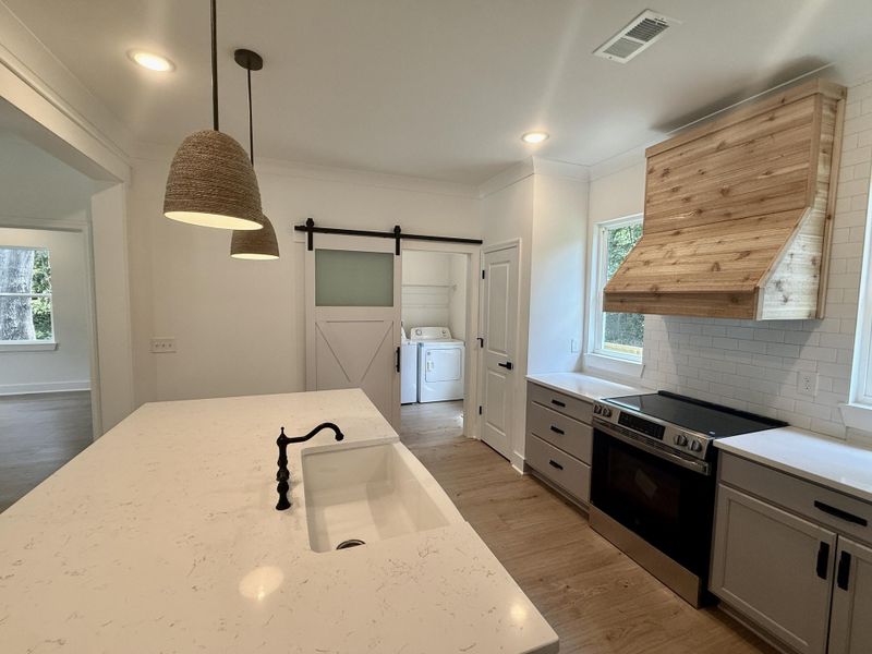 Furnished interior view inside a new home in , St. Matthews (Image 7).