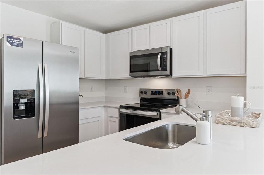 Furnished interior view inside a new home in Sandalwood, New Smyrna Beach (Image 12).