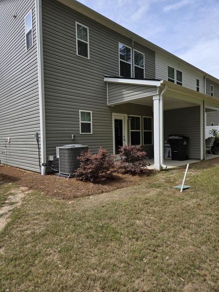 Exterior details and patio area of a home in , Charleston (Image 13).
