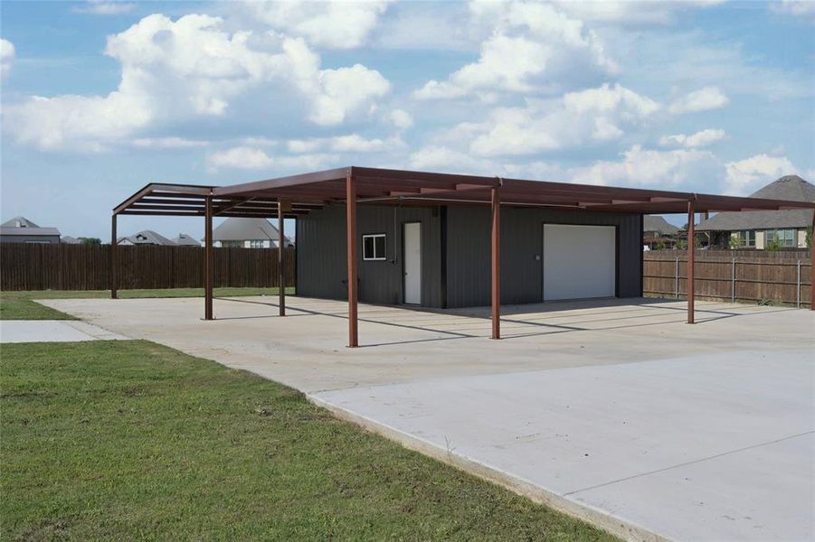 Side View of Work Shop & numerous additional parking spaces