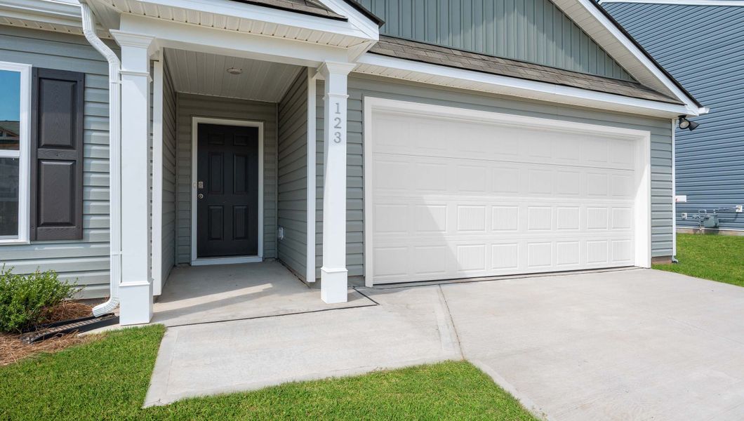 Exterior details and patio area of a home in Bentley Park, Greenwood (Image 1).
