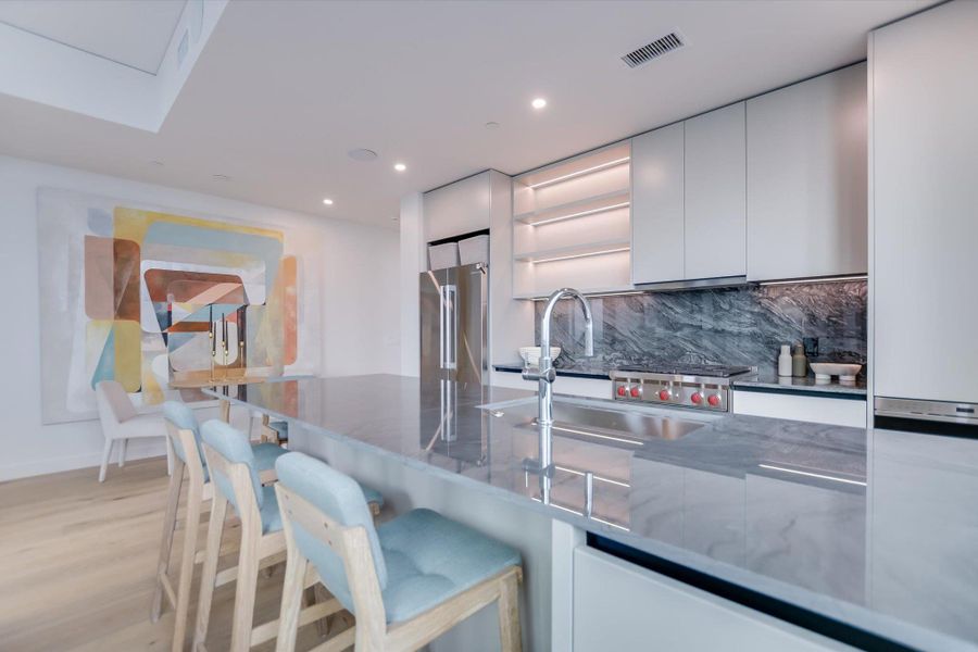 Photos shown are of the same floor plan 5 floors higher.