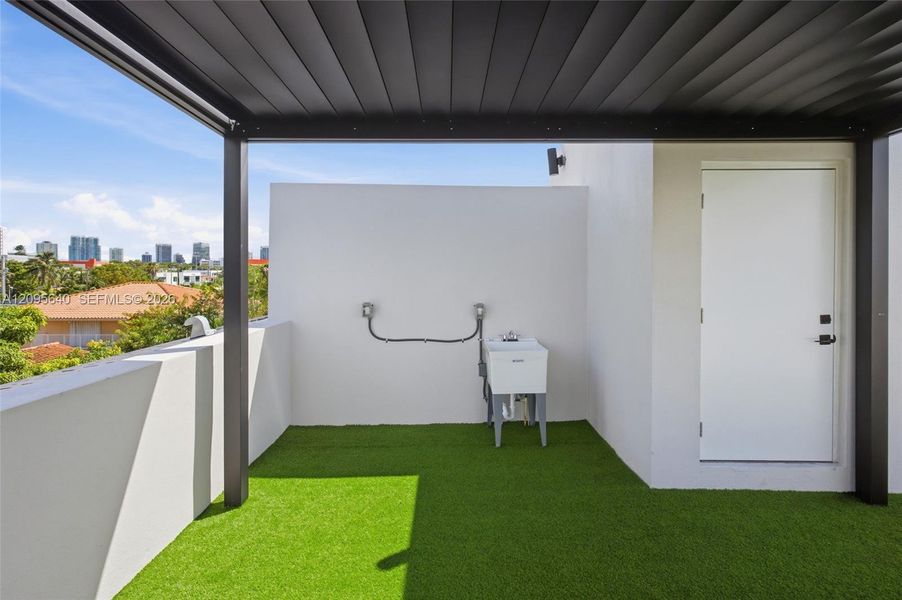 Exterior details and patio area of a home in , Miami (Image 4).