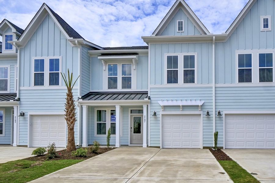 Front exterior of a new home in Grand Park, Leland, NC, highlighting curb appeal (Image 1). Front exterior of a new home in Grand Park, Leland, NC, highlighting curb appeal (Image 1).