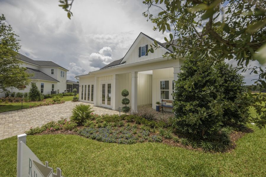 Representative exterior photo of a completed home built from the Ortega by Riverside Homes in Hidden Creek at SilverLeaf, St. Augustine, FL (Image 28). Representative exterior photo of a completed home built from the Ortega by Riverside Homes in Hidden Creek at SilverLeaf, St. Augustine, FL (Image 28).