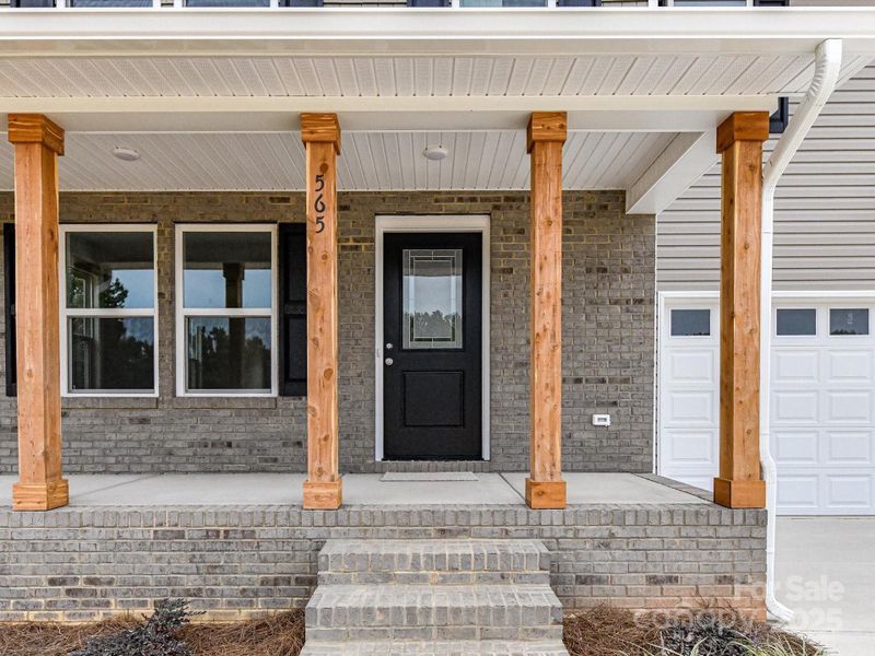 Exterior details and patio area of a home in , Oakboro (Image 19).