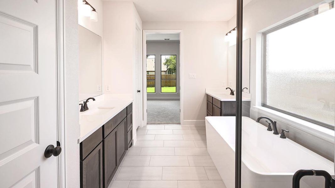 Furnished interior view inside a new home in 6 Creeks, Kyle (Image 6).