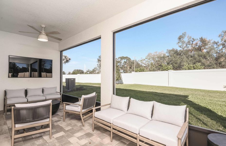 Exterior details and patio area of a home in Riverwood, Zephyrhills (Image 2).