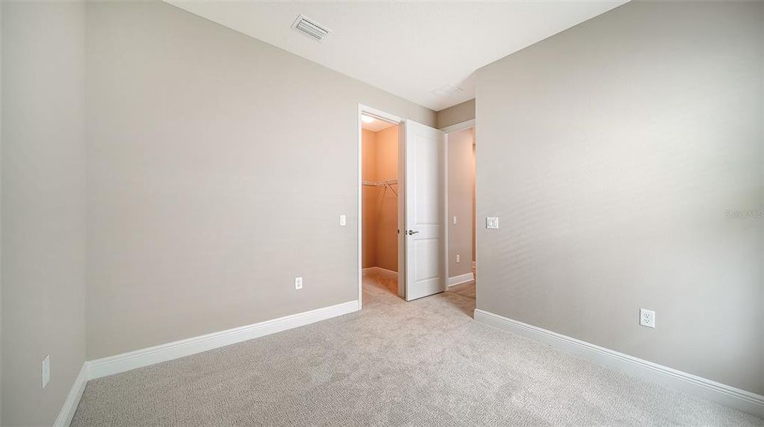 Spacious, unfurnished interior of a new home in Wildleaf at North River Ranch, Parrish (Image 24).