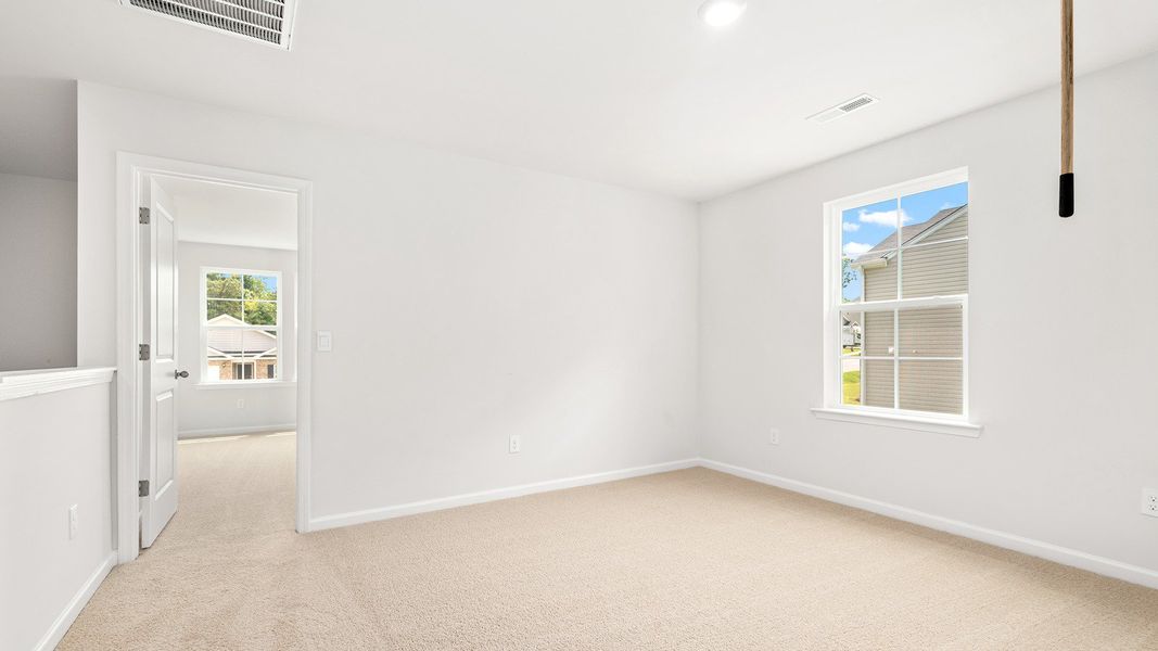 Spacious, unfurnished interior of a new home in Greystone North, Stoneville (Image 17).