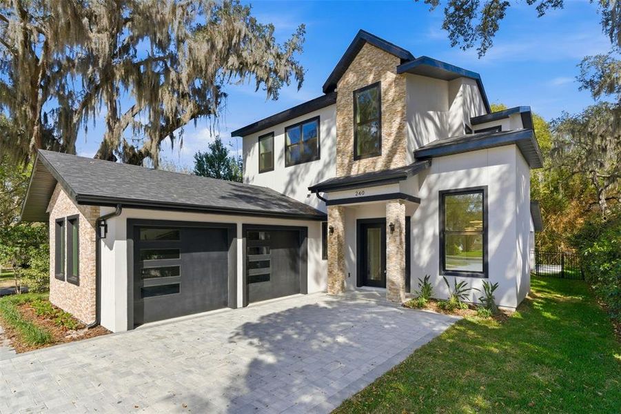 Front exterior of a new home in , Winter Park, FL, highlighting curb appeal (Image 30).