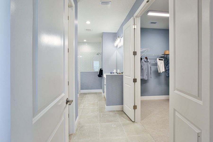 Representative furnished interior of a home built from the Sandcastle 2 by Neal Communities in Boca Royale Golf & Country Club at Wellen Park, Englewood (Image 13).