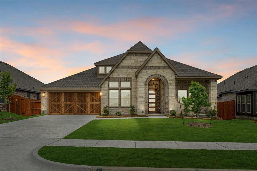 Front exterior of a new home in The Retreat at North Grove 60, Waxahachie, TX, highlighting curb appeal (Image 1). Front exterior of a new home in The Retreat at North Grove 60, Waxahachie, TX, highlighting curb appeal (Image 1).