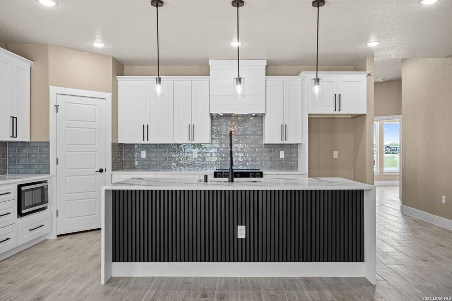 Furnished interior view inside a new home in , Atascosa (Image 7).