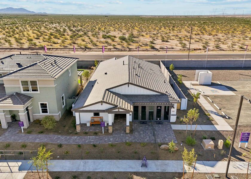 A group of houses in a field. A group of houses in a field.