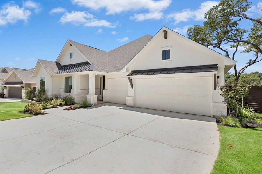 Front exterior of a new home in Riverstone, Georgetown, TX, highlighting curb appeal (Image 20).