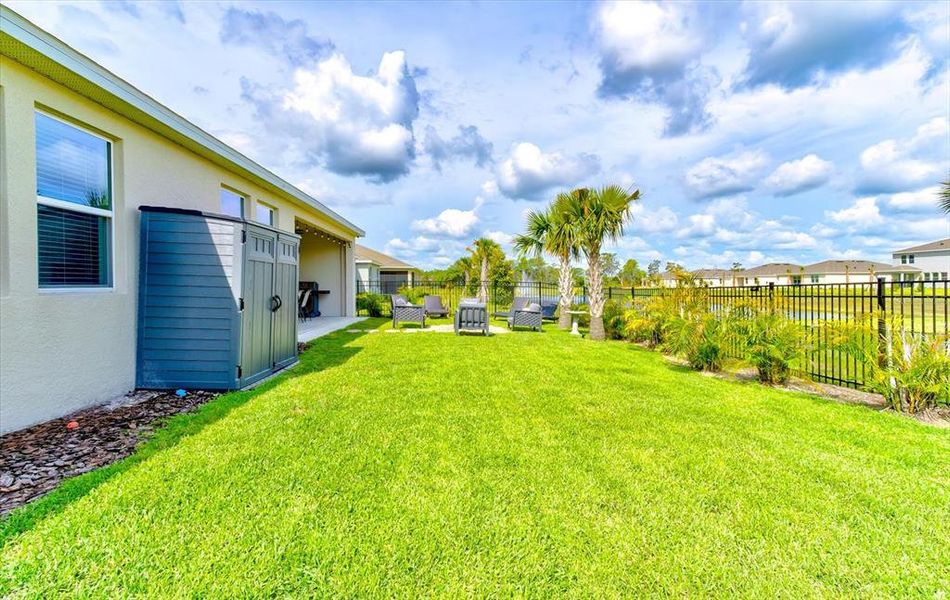 Exterior details and patio area of a home in Archers Mill, Ormond Beach (Image 4).