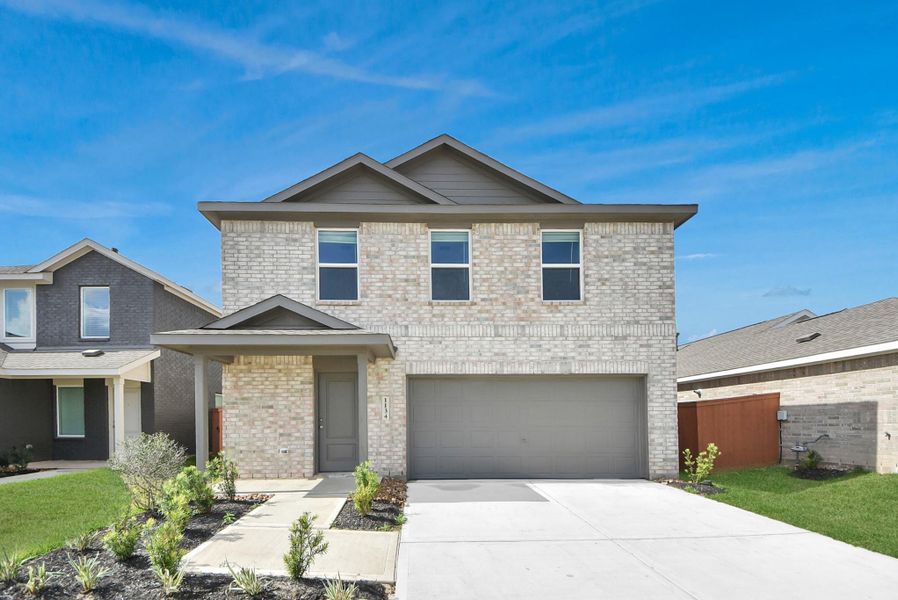 Front exterior of a new home in Emberly, Beasley, TX, highlighting curb appeal (Image 2). Front exterior of a new home in Emberly, Beasley, TX, highlighting curb appeal (Image 2).