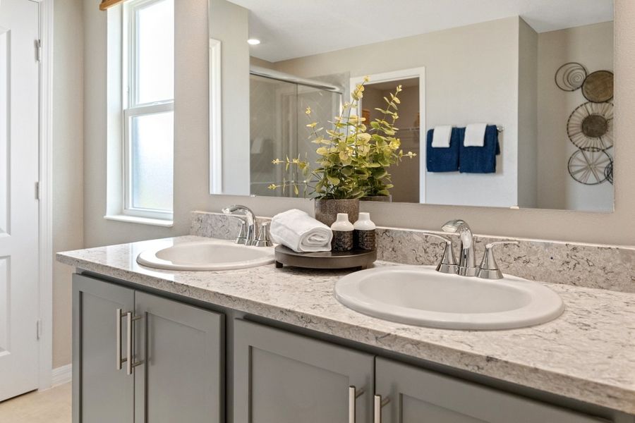 Dual-sink vanity at primary bath