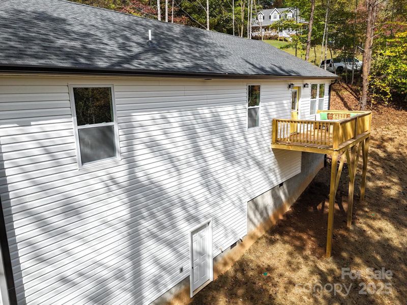 Exterior details and patio area of a home in , Candler (Image 1).