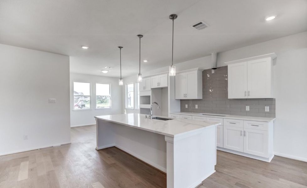 Representative furnished interior of a home built from the Breckenridge 3600 SH by Saratoga Homes in Townsen Landing, Humble (Image 3).