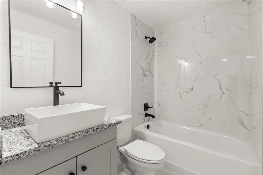 Furnished interior view inside a new home in , Dunnellon (Image 3).