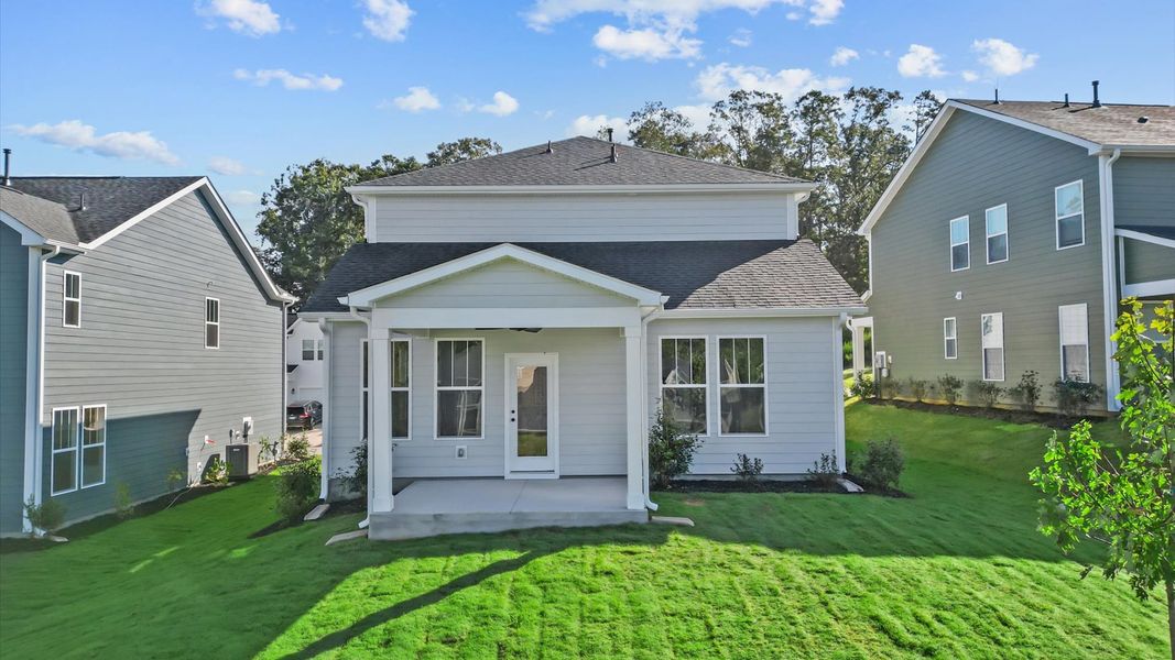 Elegant exterior with a rear covered porch—perfect for relaxing or entertaining outdoors