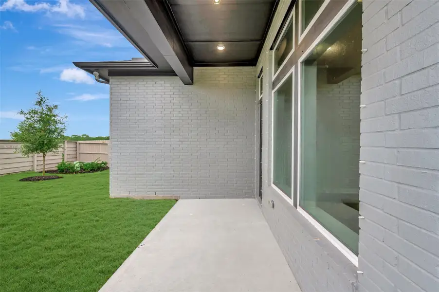 Exterior details and patio area of a home in Pomona - Reserve Collection, Manvel (Image 25).