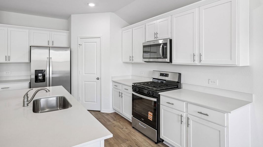 Furnished interior view inside a new home in Prairie Lakes, Buda (Image 8).
