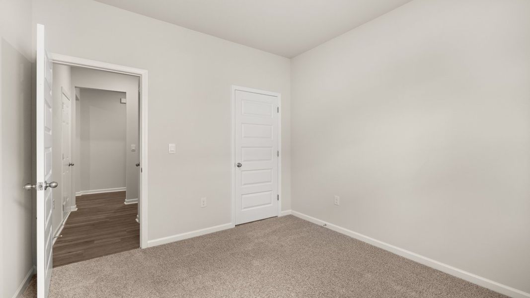 Spacious, unfurnished interior of a new home in Preserve at Dove Creek, Statham (Image 29).