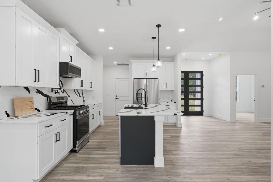 Furnished interior view inside a new home in , Conroe (Image 7).
