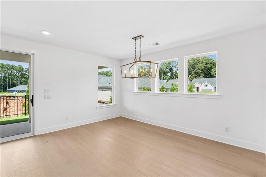 Spacious, unfurnished interior of a new home in Maple Grove at Towne Lake, Woodstock (Image 13).