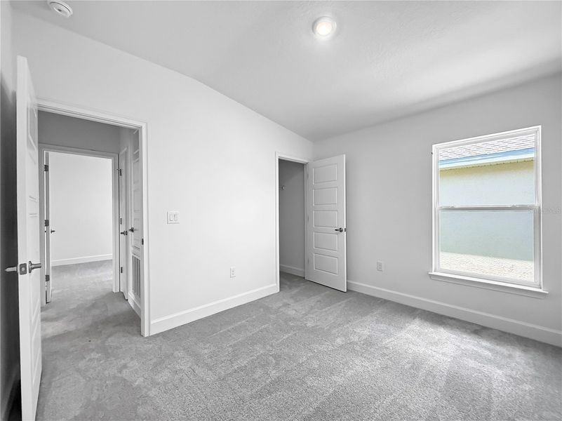 Spacious, unfurnished interior of a new home in Harmony Central, St. Cloud (Image 11).