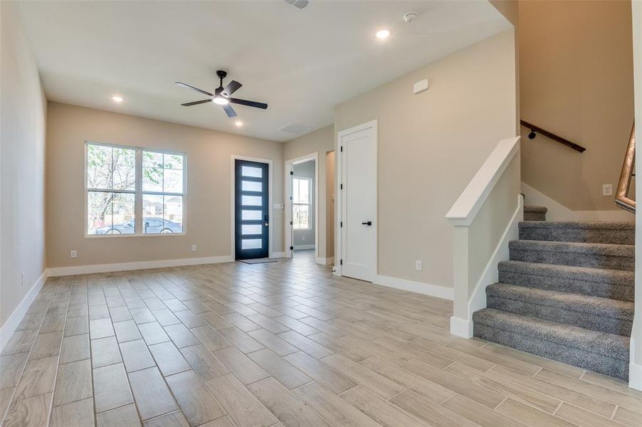 Natural lighting and grey ceramic tile flooring Natural lighting and grey ceramic tile flooring