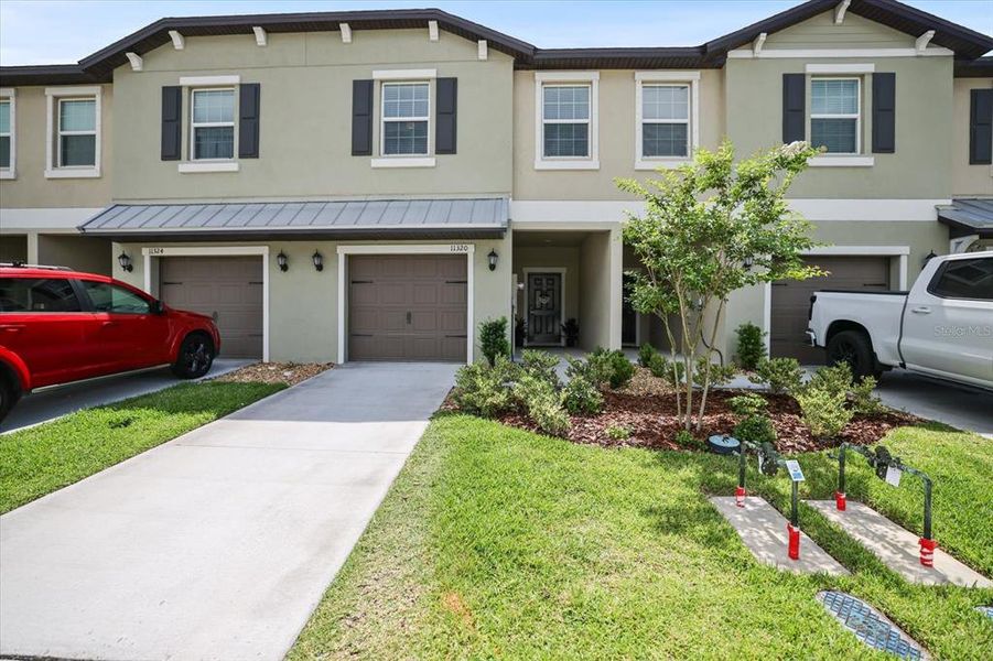 Front exterior of a new home in , Palmetto, FL, highlighting curb appeal (Image 26).