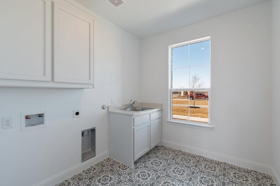 Laundry Room | Concept 2406 at The Meadows in Gunter, TX by Landsea Homes