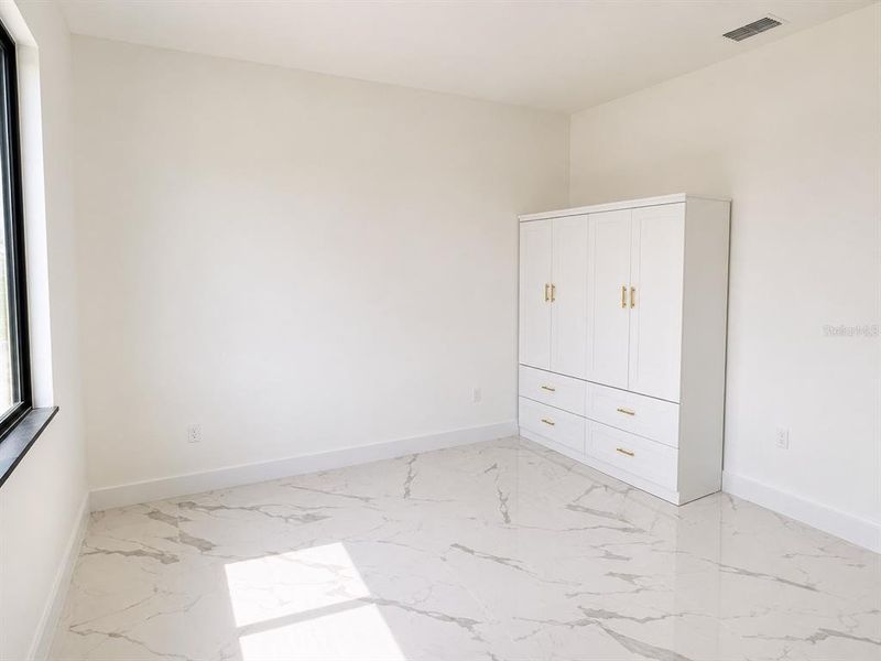 Spacious, unfurnished interior of a new home in , Cape Coral (Image 15). Spacious, unfurnished interior of a new home in , Cape Coral (Image 15).