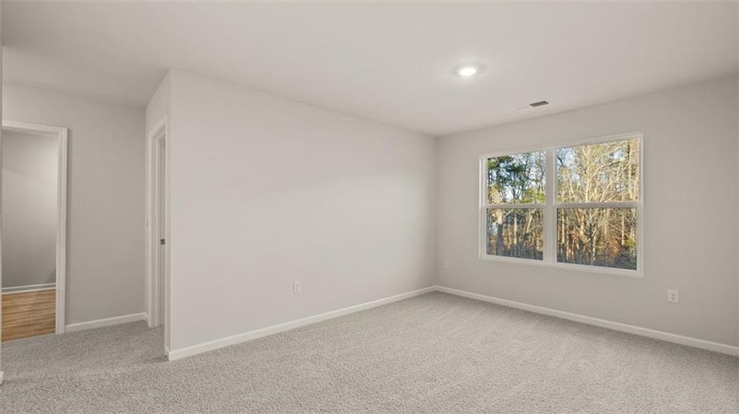 Spacious, unfurnished interior of a new home in Brooks Station, Dacula (Image 12).