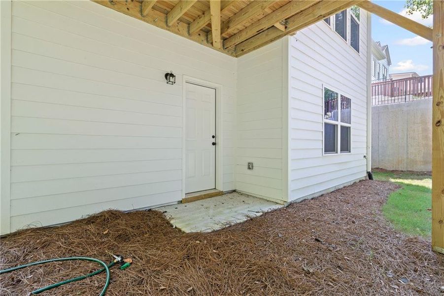 Exterior details and patio area of a home in Reunion, Hoschton (Image 26). Exterior details and patio area of a home in Reunion, Hoschton (Image 26).