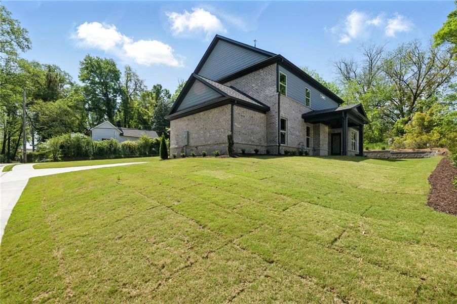 Front exterior of a new home in , Buford, GA, highlighting curb appeal (Image 24).